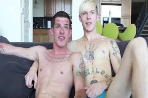 Two homo Male With Tattoos suck And poke Each Other