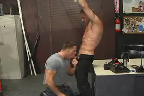 Two Muscle men In Leather Boots