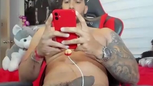 lusty Latino Hunk With Tattoos Strokes His monstrous dark cock